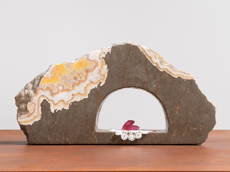 Monument, 2025. Carved and polished limestone, lost-wax cast crystal, inherited doily, waterjet-cut weathering steel.