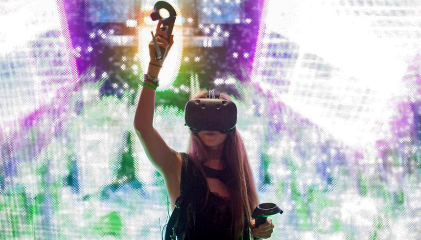 A young woman wearing a VR headset at an event