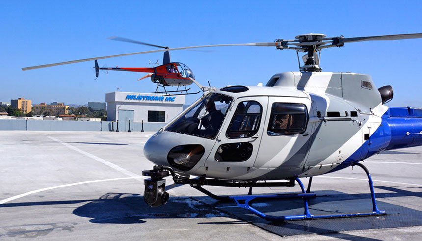 A HeliStream's, helicopter flight school, helicopter on a helipad 