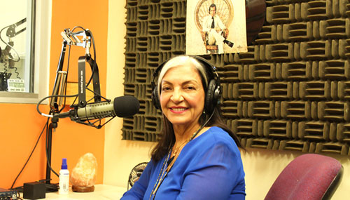 Neyda Carballo-Ricardo en su oficina y estación de radio