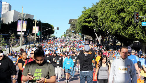 The participants at the 10th Annual HomeWalk fundrasier walking the streets of downtown LA 