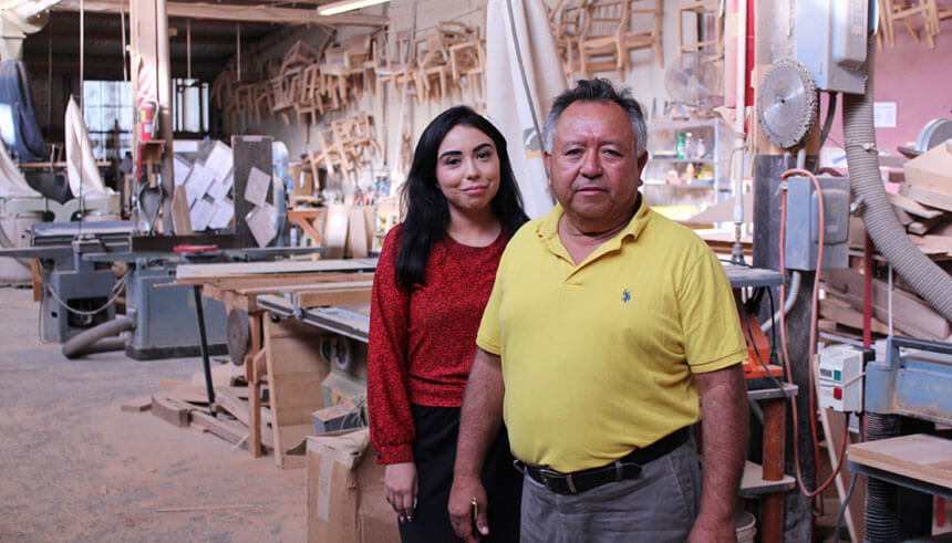 Carlos Robert Castillo and his daughter, Melissa, at Camely Furniture’s warehouse 