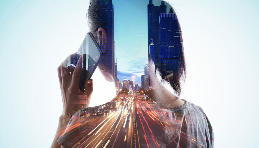 Double exposure of cityscape of Shenzhen and smart phone