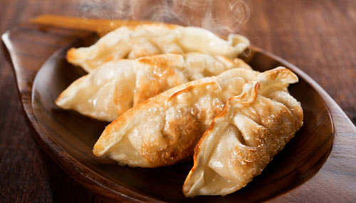 A plate with Synear Chinese dumplings