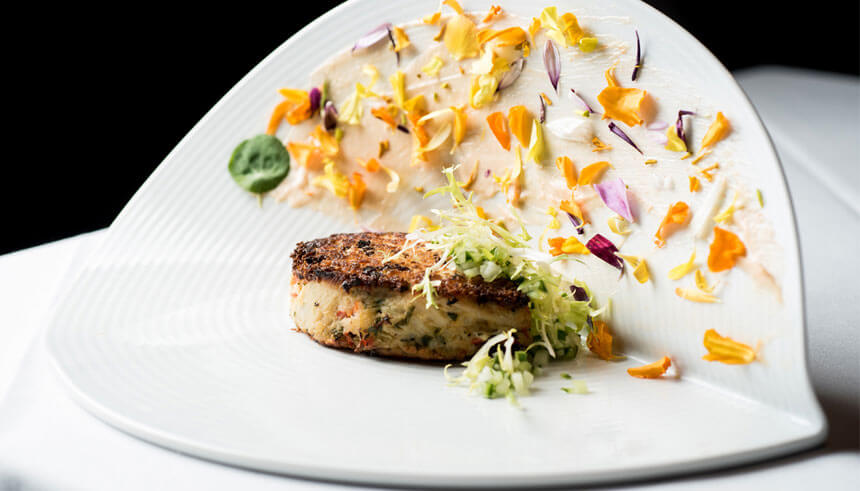 The vegan hearts of palm crab cake from Crustacean Beverly Hills’ updated menu