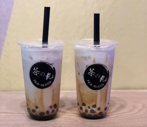 Two boba drinks side by side made with handcrafted boba