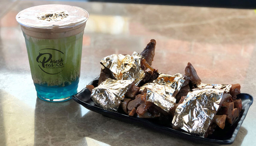 Pig trotters wrapped with gold leaf sheets and a special Lunar New Year drink from Uniboil