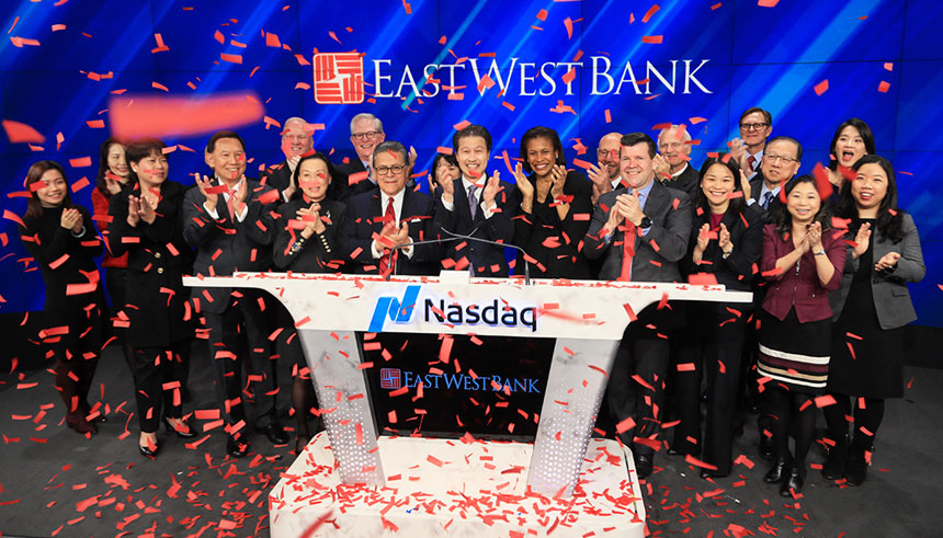 East West Bank executives and board members celebrated the company’s 20th year of going public in February 2019 by ringing the Nasdaq opening bell In New York