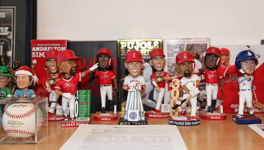 Pozil’s collection of sports bobbleheads 