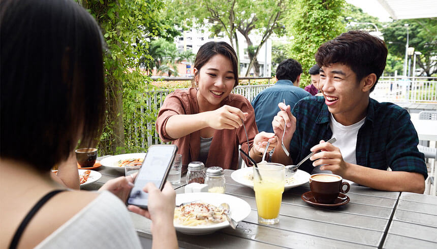 Chinese millennials eating at a restaurant