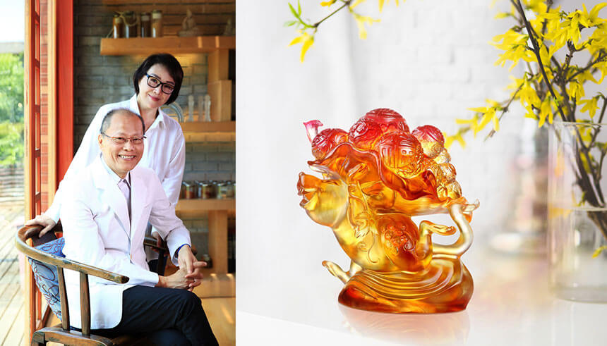 Liuli founders Chang Yi and Loretta H. Yang next to a Liuli Year of the Rat crystal sculpture