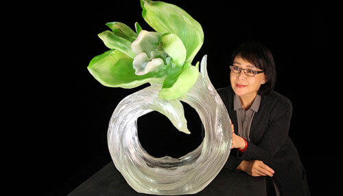 Loretta H. Yang with one of her LIULI crystal sculptures